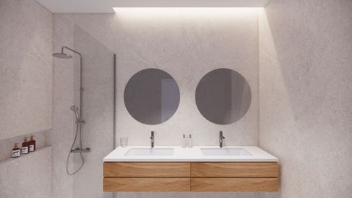 baño con espejos circulares